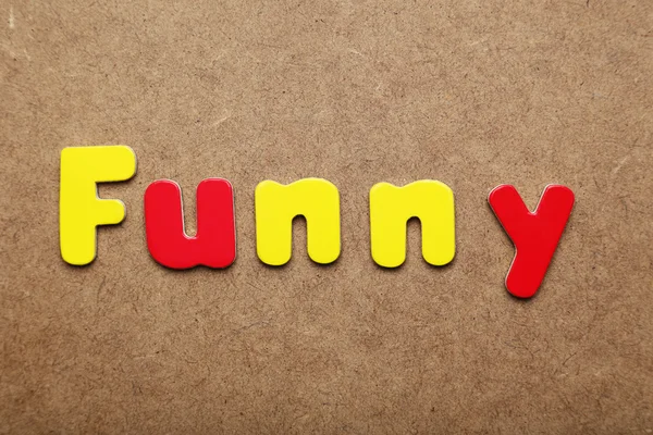 Funny word made of colorful magnets — Stock Photo, Image