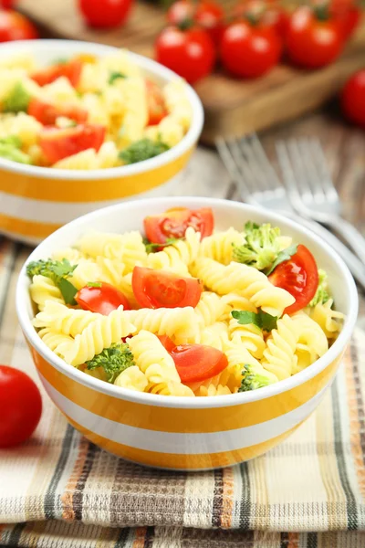 Delicious pasta in bowls — Stock Photo, Image