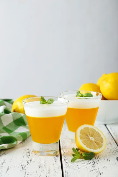 Tasty lemon jelly in glasses