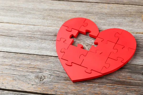 Red puzzle heart — Stock Photo, Image