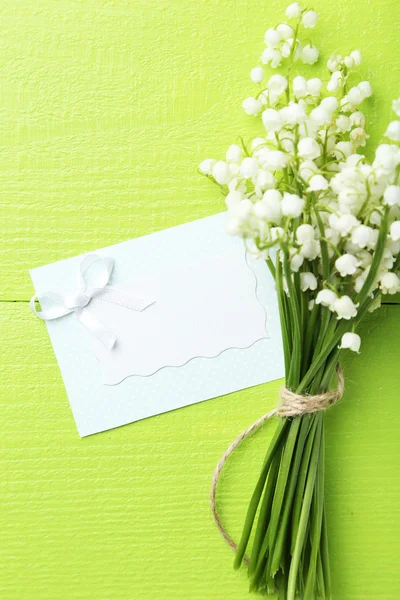 Lily of the Valley with card — Stock Photo, Image
