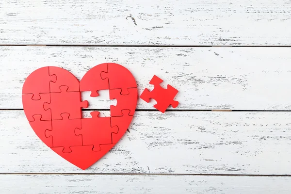 Red puzzle heart — Stock Photo, Image