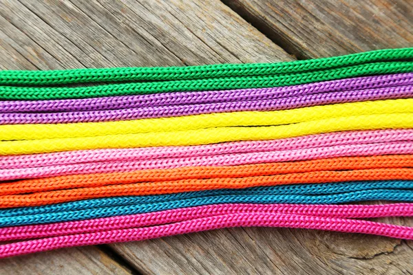 Colorful ropes on grey — Stock Photo, Image