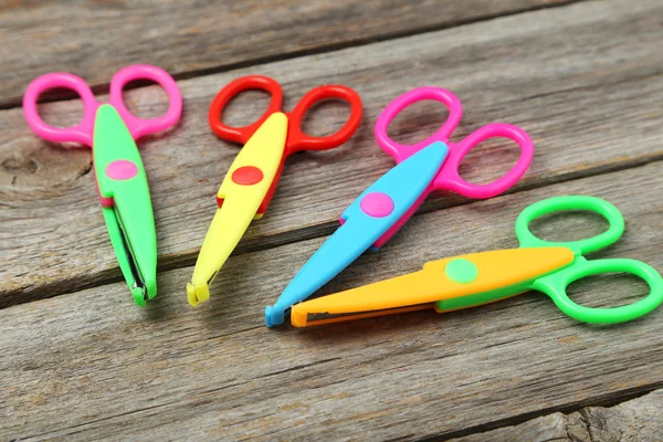 Figured scissors on grey — Stock Photo, Image