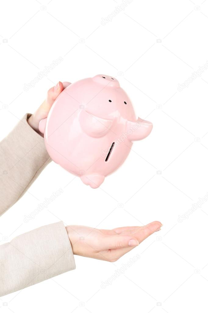 Shaking out empty piggy bank