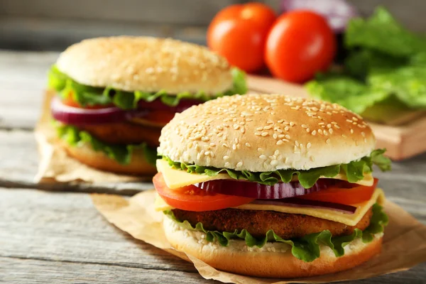 Fresh burgers with vegetables — Stock Photo, Image