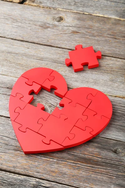 Red puzzle heart — Stock Photo, Image