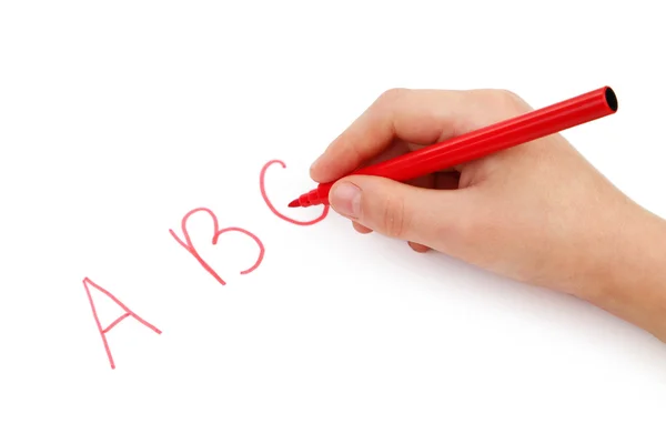 Childs handen schrijven van brieven — Stockfoto