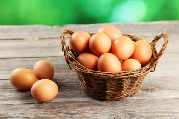 Chicken eggs in basket