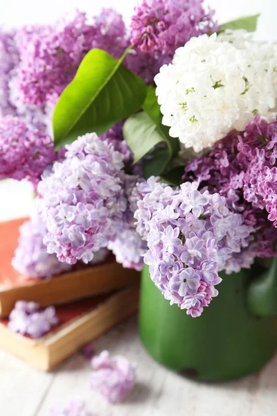 Beautiful lilac in pitcher — Stock Photo, Image