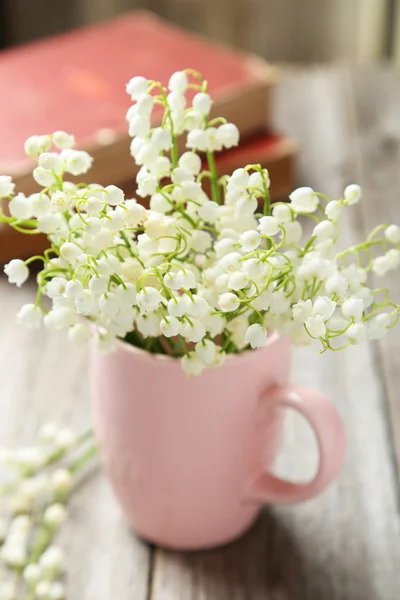 Lily of the Valley in cup — Stock Photo, Image