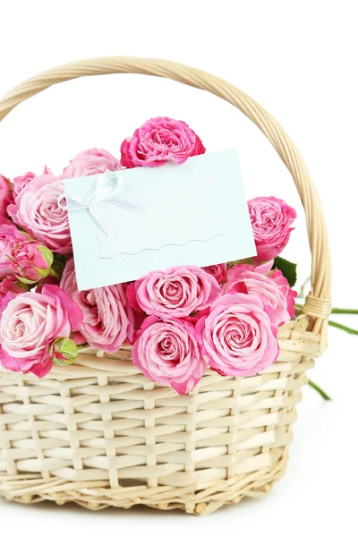 Rosas em cesta com cartão vazio — Fotografia de Stock