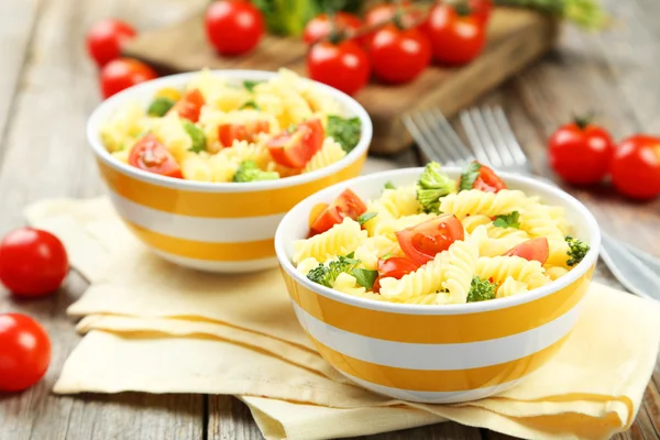 Delicious pasta in bowls — Stock Photo, Image