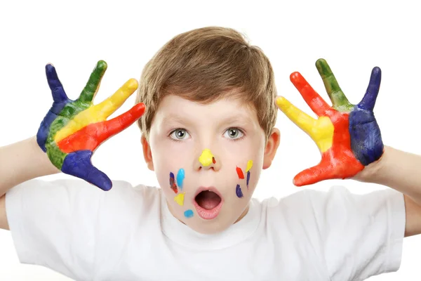 Portrait of beautiful little boy with paints on hands isolated o — Stock Photo, Image