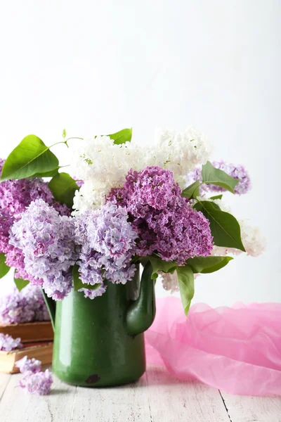 Beautiful lilac in pitcher — Stock Photo, Image