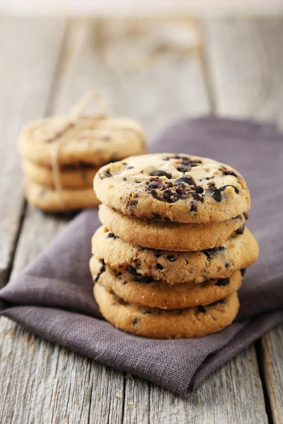 Chocolate chip cookies on grey — Stock Photo, Image