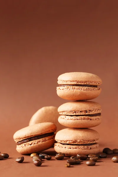 Coffee macaroons with coffee beans — Stock Photo, Image