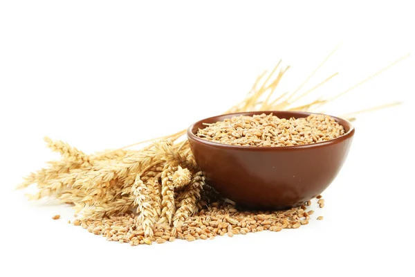 Ears of wheat and bowl of wheat grains — Stock Photo, Image