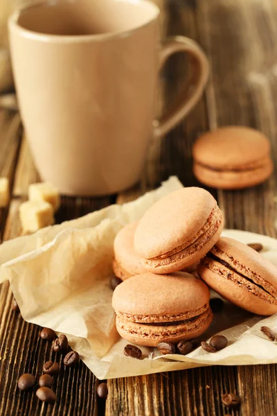 Coffee macaroons with coffee beans — Stock Photo, Image