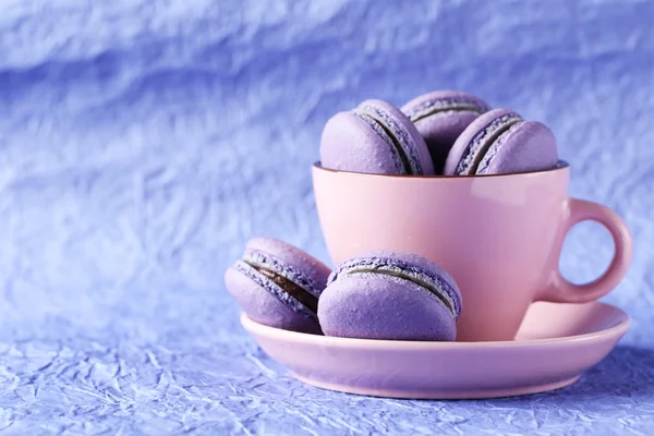 Purple macarons on paper background — Stock Photo, Image