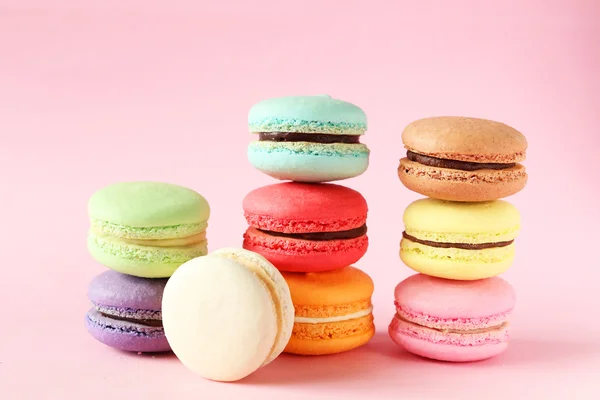 French colorful macarons on pink background — Stock Photo, Image