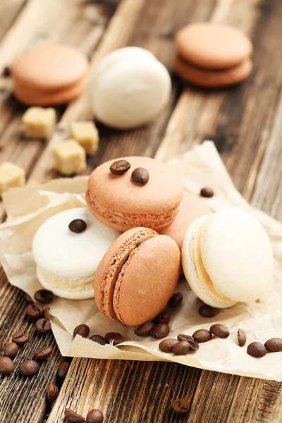 Coffee macaroons with coffee beans — Stock Photo, Image