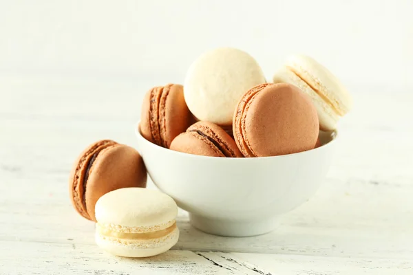 Coffee macaroons in bowl — Stock Photo, Image