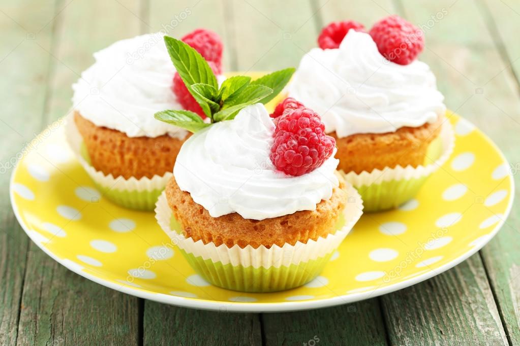 Raspberry cupcakes on plate