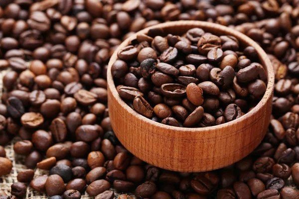Coffee beans in bowl — Stock Photo, Image