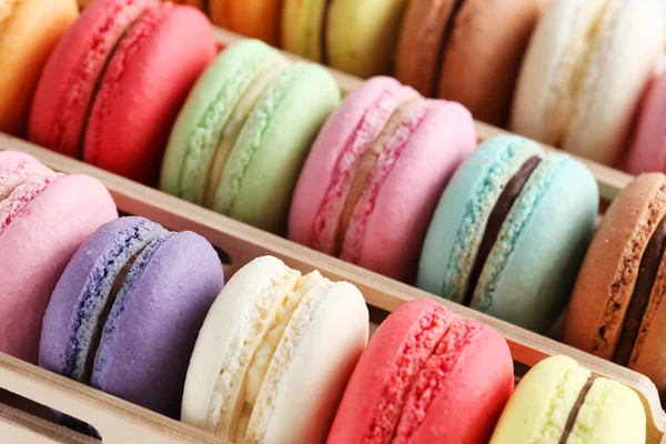 Francouzská barevné macarons pozadí — Stock fotografie