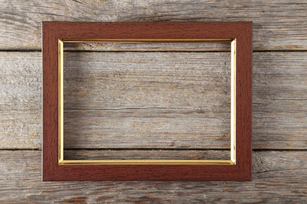 Houten frame op houten achtergrond — Stockfoto
