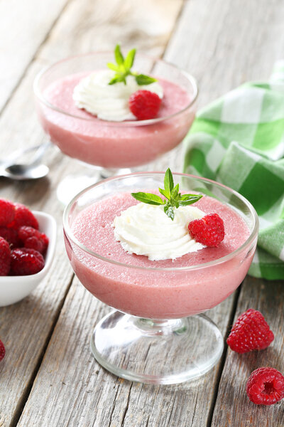 Sweet raspberry mousse in glass