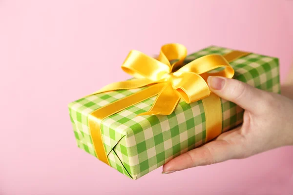 Female hands holding gift box — Stock Photo, Image