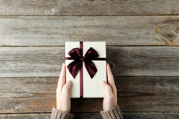 Wooden Hand Holding Silk Ribbon. Stock Image – Her Creative Studio