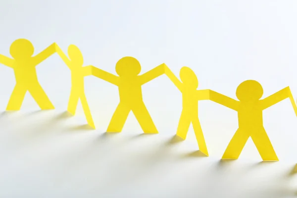 Paper people on the white background — Stock Photo, Image