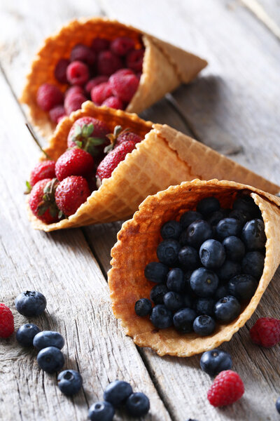 Waffle cones with berries