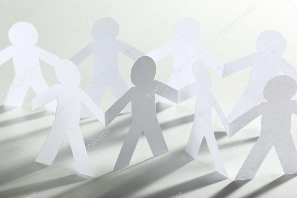 Paper people on the white background