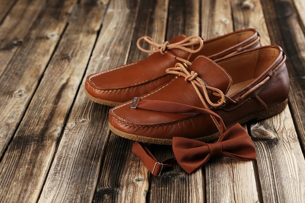 Fashion brown shoes with bow tie — Stock Photo, Image