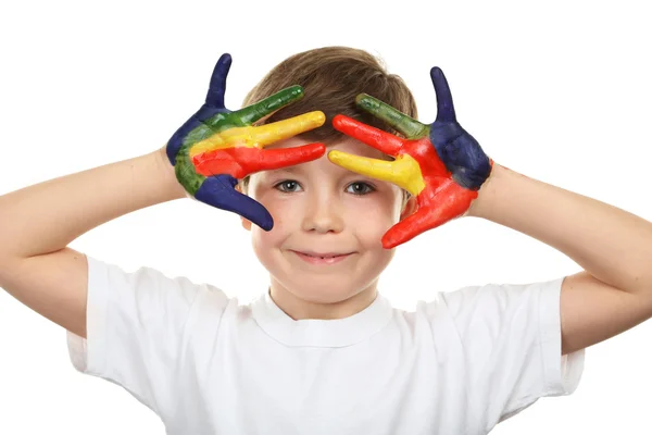 Porträt des schönen kleinen Jungen mit Farben auf den Händen isoliert o — Stockfoto