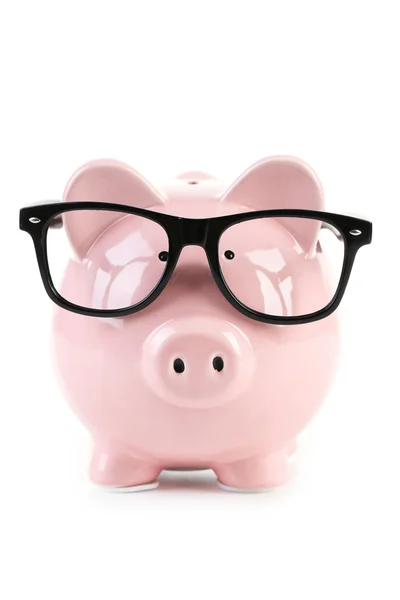 Pink piggy bank with glasses — Stock Photo, Image