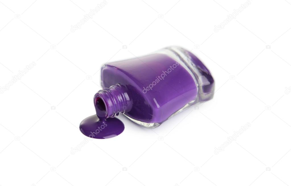 Bottle of spilled purple nail polish