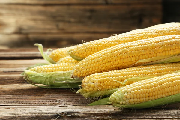 Corns on  wooden background — Stock Photo, Image