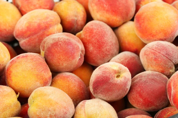 Mogen persika frukt bakgrund — Stockfoto
