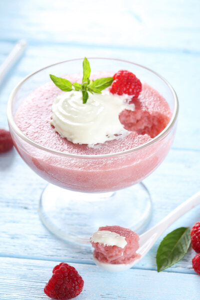 Sweet raspberry mousse in glass