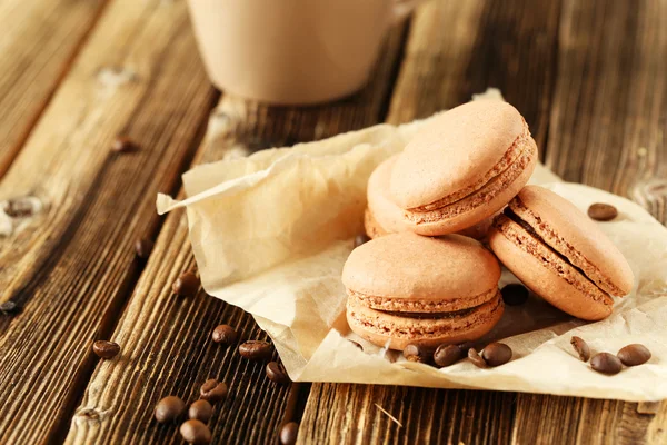 Coffee macarons with coffee beans — Stock Photo, Image