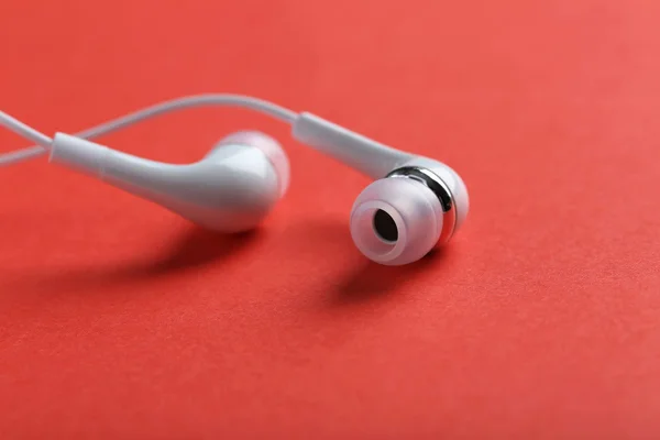 Auriculares sobre fondo de papel — Foto de Stock