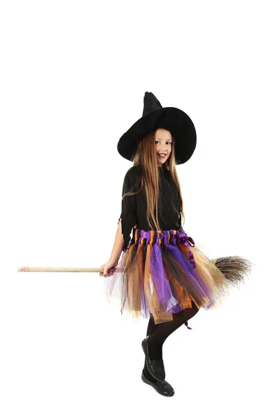 Piękna dziewczyna czarownica z miotłą — Zdjęcie stockowe