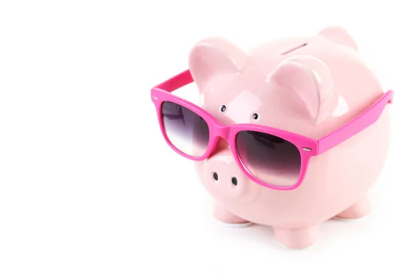 Růžová prasátko banka s brýlemi — Stock fotografie