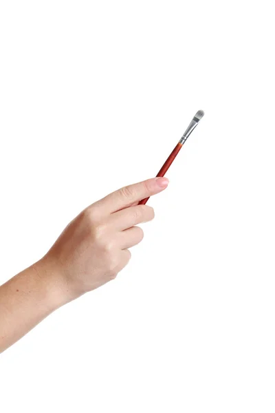 Female hand with brush for make-up — Stock Photo, Image