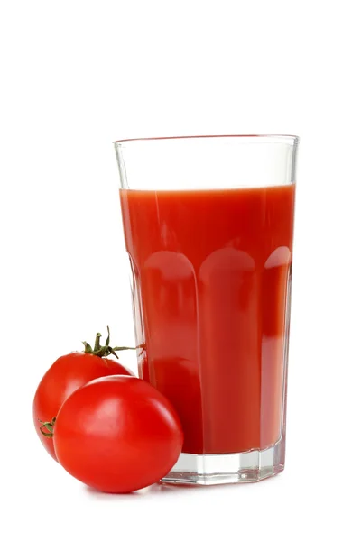 Tomates vermelhos frescos e sumo de tomate em vidro — Fotografia de Stock